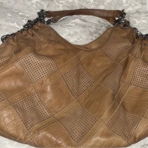 B. Makowsky Leather Handbag.
